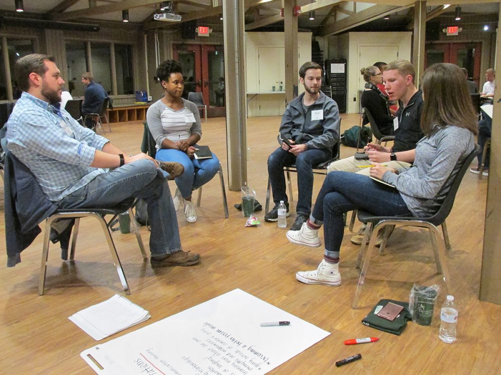 Leadership Academy students sit in a circle for discussion