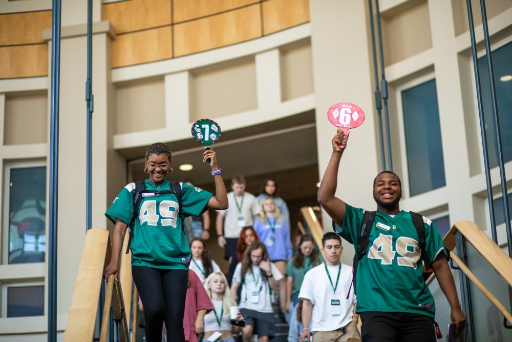 UNC Charlotte guides leading an admissions tour