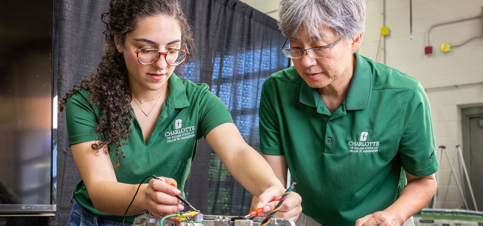 Professor and student working on a project in BATT CAVE