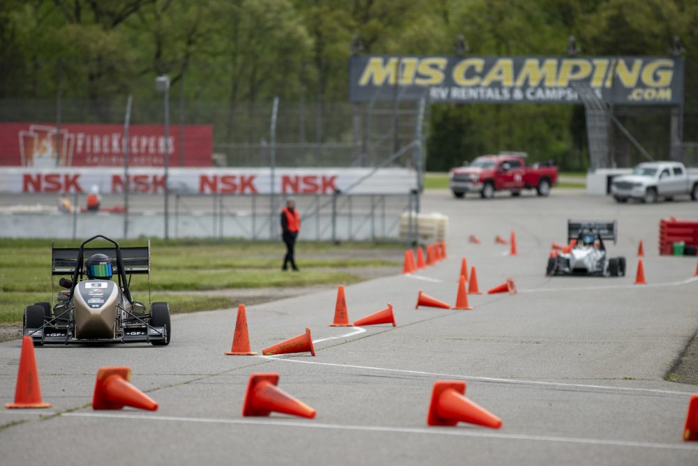 49ers Racing team member drives car during competition