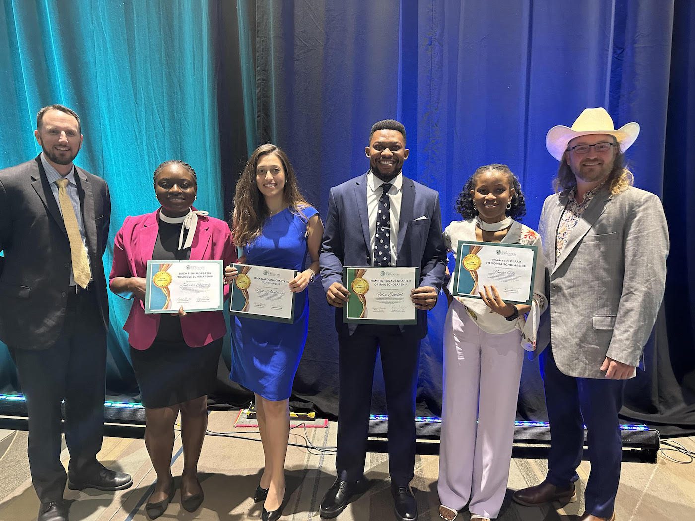 Engineering graduate students presented with awards at IFMA Conference