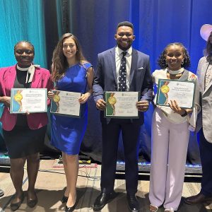 (l to r): Jake Smithwick, Graduate Program Director, Construction and Facilities Engineering; Juliana Somuah; Nada Aboelmagd; Felix Fiifi Ekuful; Nneka Ubi; and Dallas Schwerin, Treasurer, IFMA Charlotte Chapter 