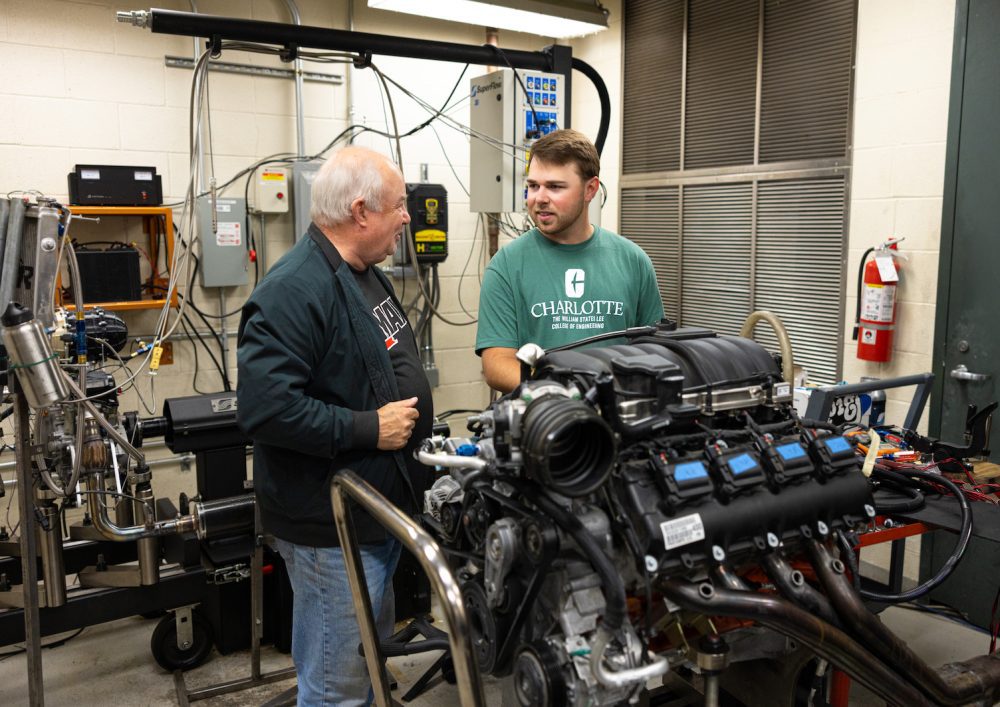 Layne Riggs speaking with Jim Fox in the Kulwicki Laboratory