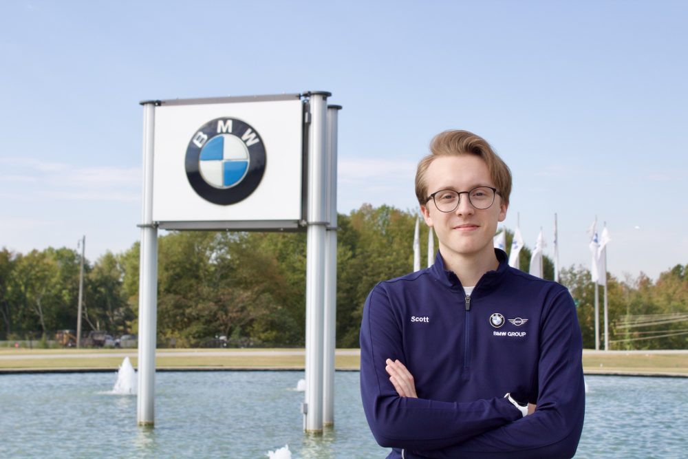 Scottie Stewart pictured beside BMW sign at plant in Spartanburg, S.C.