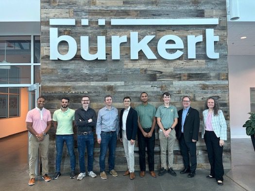 Engineering students and Dean Keynton with Burkert engineers at company headquarters