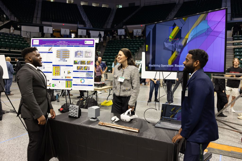 Engineering seniors discuss their project at the senior design expo