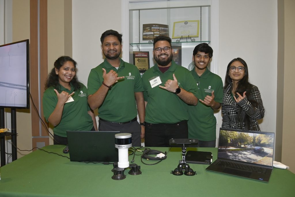 A group of civil engineering students gathered in a group