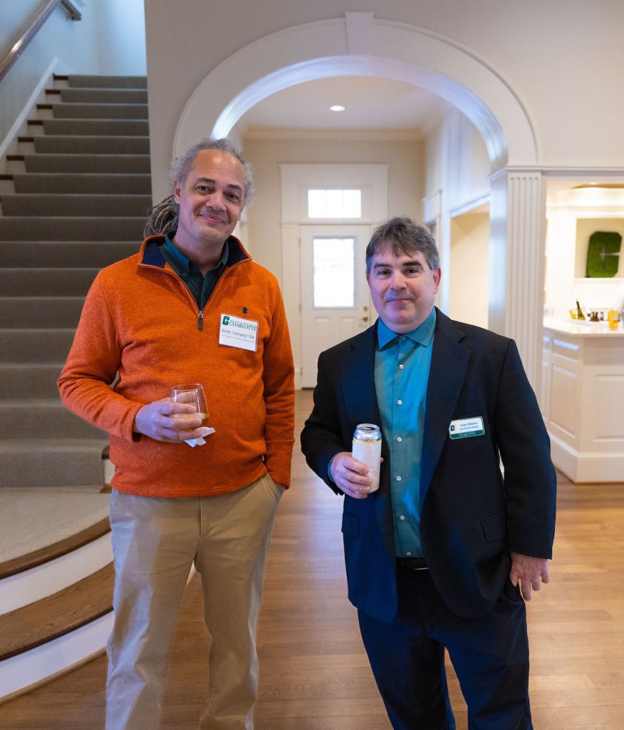 William States Lee College of Engineering's Associate Dean of Academic Affairs Brett Tempest speaks with Senior Associate Dean and Professor of Economics Artie Zillante of the Belk College of Business