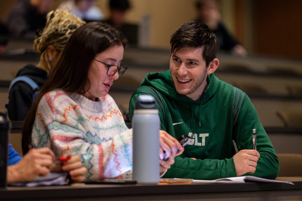 Two students talking to each other