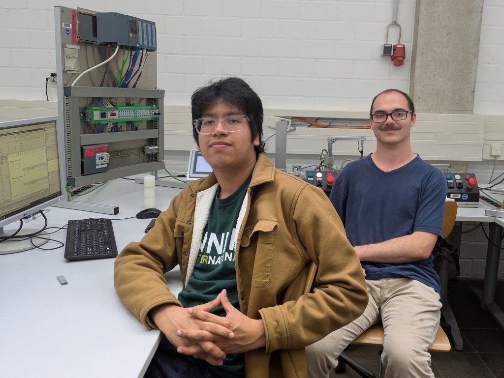 Two Niner Engineering students working in a lab at HKA