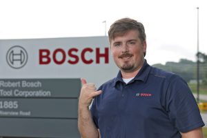 Davey Sides at Bosch building sign