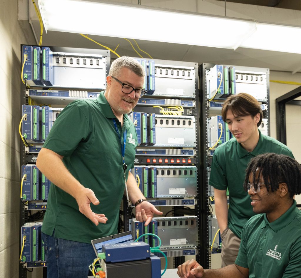 Instructor trains students with equipment