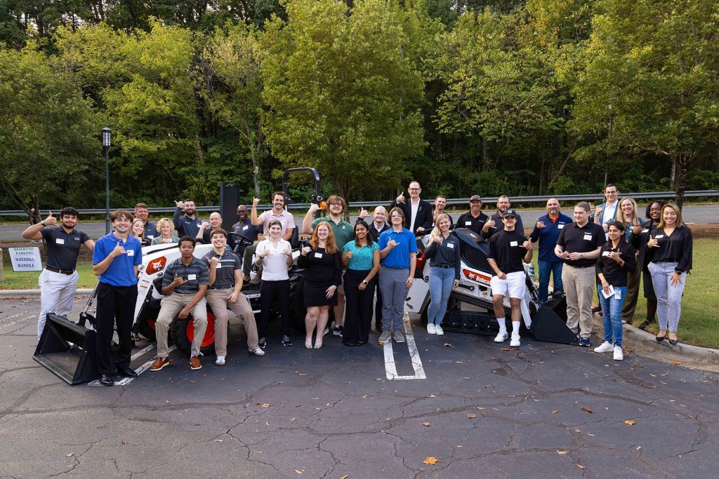 2025 inaugural cohort of Bobcat Scholars, company leaders and university administrators celebrate new program and partnership during October event.